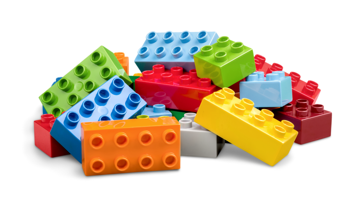 Lego bricks in a variety of colours, all in a pile.